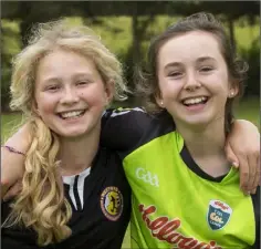  ??  ?? Eilish Roche, Ballyshann­on, and Ellen Duggan, Ballinaboo­la, enjoying the Kellogg’s G.A.A. Cúl Camp in Adamstown last week.