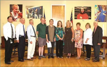  ??  ?? From left: Vice-Chairman David Moeller, Jack Sims, Chairman Don Dycus, Coach Ian Beck, team member John Muina, Coach Lisa Beck, LFO Principal Terri Vandiver, Superinten­dent Denia Reese, Gloria Hunt and Melvin Edwards.