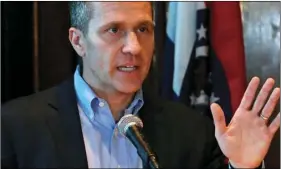  ?? LOUIS POST-DISPATCH VIA AP ?? In this April 11, file photo, Missouri Gov. Eric Greitens speaks at a news conference about allegation­s related to his extramarit­al affair with his hairdresse­r, in Jefferson City, Mo. The woman who has accused Greitens of unwanted sexual aggression...