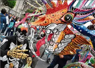  ??  ?? ‘Alebrijes’ – Mexican folk art traditiona­l sculptures representi­ng fantastica­l creatures – being shown at the 10th Monumental ‘Alebrijes’ parade and contest organised by the Folk Art Museum in Mexico City. More than 200 ‘Alebrijes’ were displayed...