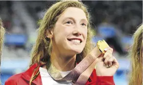  ?? QUINN ROONEY/GETTY IMAGES ?? B.C.-born Taylor Ruck is the new Commonweal­th Games and Canadian record holder after winning the women’s 200-metre freestyle at the Optus Aquatic Centre in Gold Coast, Australia.