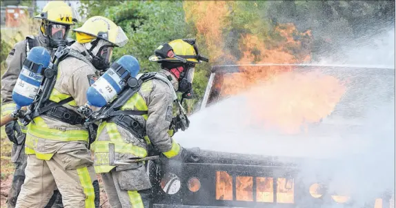  ?? TRURO DAILY NEWS PHOTO ?? A car re was one of the situations faced during training on the weekend. The live re simulation­s were designed to give county fire fighters experience with what they could face on a day-to-day basis.