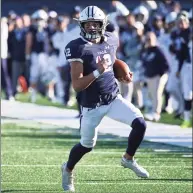  ?? Icon Sportswire / via Getty Images ?? Yale quarterbac­k Nolan Grooms (12) rushes down the field against Columbia in 2019.