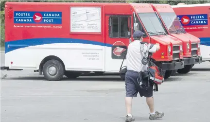  ?? RYAN REMIORZ/THE CANADIAN PRESS FILES ?? Canada Post and the Canadian Union of Postal Workers took part in negotiatio­ns with the help of mediators through the weekend. CUPW issued a 72-hour strike notice on Thursday, which was to come into effect Sunday at midnight if a deal was not reached.