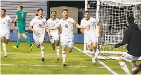  ?? MARYLAND ATHLETICS ?? Maryland senior midfielder Amar Sejdic (10) celebrates after scoring a penalty-kick goal in the 57th minute during the national championsh­ip game in Santa Barbara, Calif.