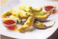  ?? ROMAIN BLANQUART/TNS ?? Shishito Pepper Tempura makes a great snack or first course.