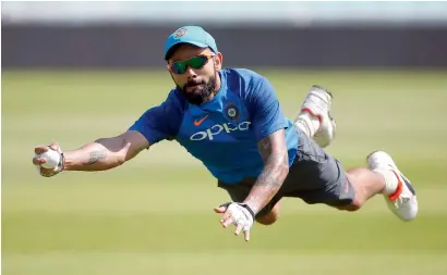  ?? Reuters ?? india’s Virat Kohli fields during a practice session at the oval on saturday. —