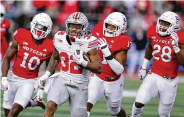  ?? NOAH K. MURRAY / AP ?? Ohio State running back TreVeyon Henderson’s return from injury has coincided with back-to-back productive outings for the running game in general. His speed has made a difference, but OSU continues to tinker with its schemes.