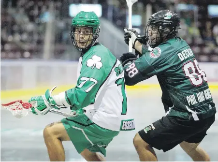  ??  ?? Shamrocks forward Jeff Shattler spins away from Lakers defender Jackson Decker during Game 1 on Tuesday.