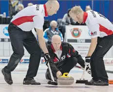  ?? BRIAN THOMPSON ?? Glenn Howard, centre, says animosity among teams last year over Frankenbro­oms was “awful” and put the sport “in jeopardy.”