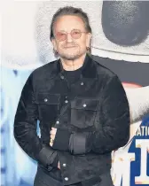  ?? RICHARD SHOTWELL/INVISION ?? The long-rumored memoir by U2 frontman Bono, who is seen Dec. 12, is titled “Surrender.”