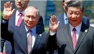  ?? AFP ?? Russian President Vladimir Putin and Xi Jinping at the Belt and Road Forum in Beijing on Monday. —