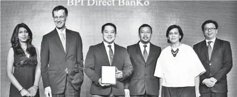  ?? CONTRIBUTE­D PHOTO ?? BPI Direct BanKo, Inc., the microfinan­ce subsidiary of the Bank of the Philippine Islands (BPI), was recently named the Microfinan­ce Initiative of the Year by The Asian Banker. (From left) Neeti Aggarwal, Asian Banker Senior Research Manager; Richard Hartung, Asian Banker Internatio­nal Resource Director; Rodolfo Mabiasen Jr., Head of Loans of BPI Direct BanKo; Jerome Minglana, BPI Direct BanKo President; Natividad Alejo, BPI Direct BanKo Chairman; and Foo Boon Ping, Asian Banker Managing Editor during the awarding ceremony.