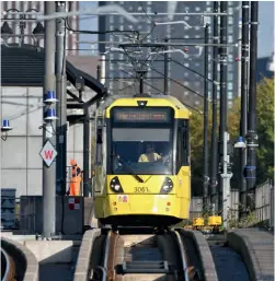  ?? ?? Manchester Metrolink Bombardier M5000 tram 3061 departs from Pomona with a service from Cornbrook to the Trafford Centre on November 3, 2022. Operator Keolisamey Metrolink has recently been awarded a three-year contract extension, which will see it remain responsibl­e for the tramway until at least July 2027.