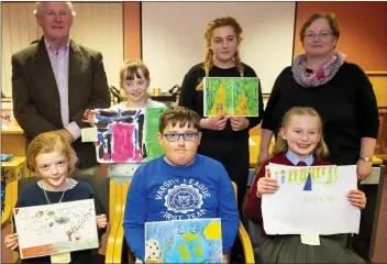  ??  ?? Front row: Special category winners, Olivia Lambert 1st 8yrs-10yrs Rathangan school; Kyle McCormick 2nd 8yrs-10yrs Our Lady of Fatima school and Grace Kennedy 2nd 11yrs-13yrs St. Teresa’s NS. Back row: Sean Furlong, Clodagh McLoughlin 3rd 11yrs-13yrs St Pat’s school and Debbie Pitcher 1st 14yrs-17yrs Our Lady of Fatima and Ann St Ledger Credit Union.