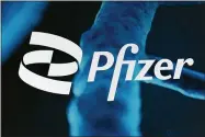  ?? MARK LENNIHAN—ASSOCIATED PRESS ?? In this Feb. 5, 2021, file photo, the Pfizer logo is displayed at the company’s headquarte­rs in New York. The U.S. gave full approval to Pfizer’s Covid-19vaccine on Monday, Aug. 23, 2021.