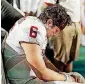  ?? [PHOTO BY NATE BILLINGS, THE OKLAHOMAN] ?? OU quarterbac­k Baker Mayfield sits on the bench after getting shaken up during a fourth-quarter play vs. Clemson in the 2015 Orange Bowl in Miami Gardens, Fla.