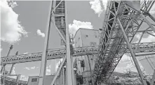  ?? Jae S. Lee / TNS ?? Conveyor belts that carried coal are seen at the former Sandow power plant near Rockdale, which was shut down this year.