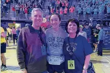  ?? ?? Kaitlyn Buell with her parents at the THON.