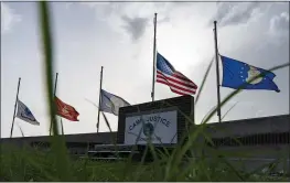  ?? ALEX BRANDON — THE ASSOCIATED PRESS ?? Flags fly at half-staff in honor of the U.S. service members and other victims killed in the terrorist attack in Kabul, Afghanista­n, at Camp Justice, Sunday in Guantanamo Bay Naval Base, Cuba.