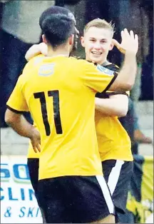  ??  ?? ADE BOY! Folkestone celebrate Ade Yussuf’s opener