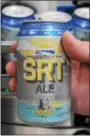  ?? DIGITAL FIRST MEDIA FILE PHOTO ?? Cans of Sly Fox’s SRT Ale are shown coming off the line at the brewery in this file photo. SRT Ale will be available for the season starting Saturday.