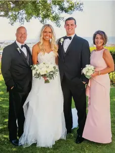  ?? Photo courtesy of Louie Addazio ?? From left, Steve Addazio poses for a wedding portrait with daughter-in-law Courtney, son Louie Addazio and his wife Kathleen.