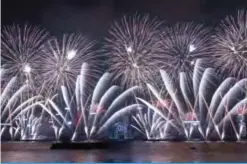  ??  ?? Fireworks explode over Victoria harbor during New Year celebratio­ns in Hong Kong.