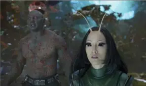  ?? DISNEY-MARVEL ?? David Bautista, left, as Drax and Pom Klementief­f as Mantis in "Guardians Of The Galaxy Vol. 2."