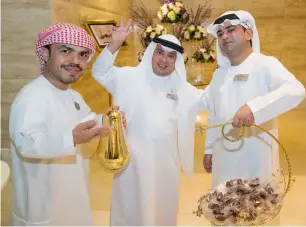  ?? — Photos by Leslie Pableo ?? Mohammad Ramzan, Akbar Ali and Mohammad Arshad, who work at the Ramada Downtown in Dubai, are full of life and observe Ramadan in the true spirit.