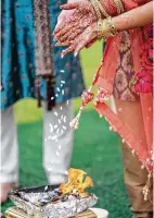  ?? A&A Video and Photograph­y ?? The bride’s family priest from the Arya Samaj of Houston performed a Hindu ceremony in her parent’s backyard.