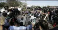  ?? ERIC GAY — THE ASSOCIATED PRESS ?? Law enforcemen­t officials hold a news conference at the scene of a shooting at the First Baptist Church of Sutherland Springs, Monday in Sutherland Springs, Texas. A man opened fire inside the church in the small South Texas community on Sunday,...