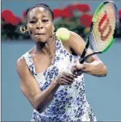  ?? John G. Mabanglo European Pressphoto Agency/Shuttersto­ck ?? VENUS WILLIAMS returns a shot by sister Serena Williams on the way to a straight-sets victory.