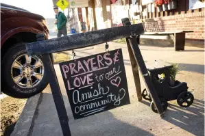  ?? (AP Photo/gene J. Puskar) ?? A sign is seen on the sidewalk Thursday outside an antique store in Spartansbu­rg, Pa. Shawn C. Cranston was arrested Saturday and charged with the slaying of a pregnant Amish woman whose body was found last week.