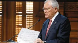  ?? BOB ANDRES / AJC ?? Gov. Nathan Deal outlines his budget before the joint appropriat­ion committee Tuesday at the Capitol in Atlanta.