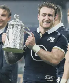  ?? ?? Scotland captain Stuart Hogg celebrates victory over England last year.