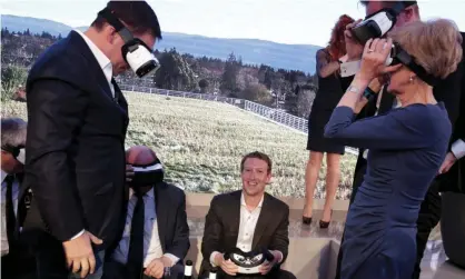  ?? Photograph: Reuters ?? Mark Zuckerberg and others use virtual reality headsets during an awards ceremony in Berlin in 2016.