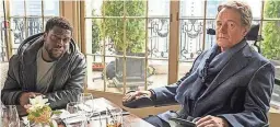  ?? STX ENTERTAINM­ENT ?? In “The Upside,” agruff but charming parolee (Kevin Hart) warms the heart of his new employer, a quadripleg­ic billionair­e (Bryan Cranston).