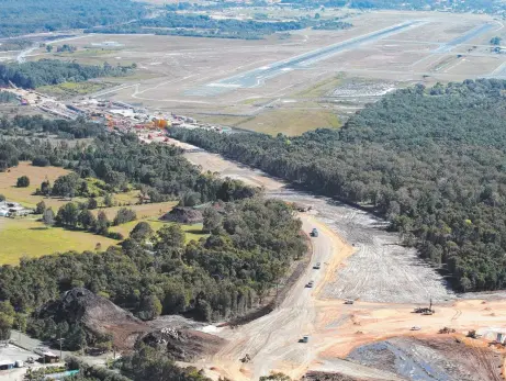  ?? ?? The Tugun Bypass under constructi­on. The new road was finally completed in 2008 and shaved 10 minutes off the drive.