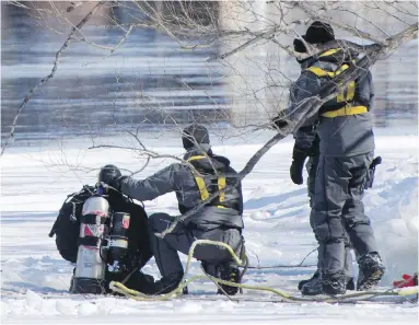  ?? CP ?? Police divers in Montreal have searched the Rivière des Prairies six times this week but found no clues.