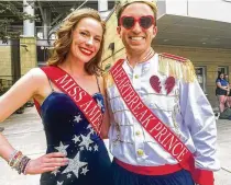  ?? ?? Celeste and Doug Lisko from Columbus wore a look inspired by Swift’s song “Miss Americana and the Heartbreak Prince.”