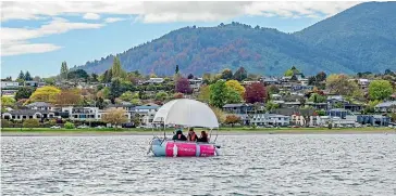  ??  ?? BELOW: Left, you don’t need any experience to captain a doughboat; right, Waih¯ı Beach is quiet over winter.