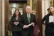  ?? J. SCOTT APPLEWHITE — ASSOCIATED PRESS ?? Senate Majority Leader Mitch McConnell, R-Ky., leaves the chamber Wednesday after announcing an agreement in the Senate on a two-year budget deal.