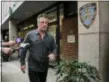  ?? PHOTO — JULIE JACOBSON ?? Actor Alec Baldwin walks out of the New York Police Department’s 10th Precinct, Friday in New York. Baldwin was arrested Friday after allegedly punching a man in the face during a dispute over a parking spot outside his New York City home, authoritie­s said.