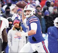  ?? Kevin Hoffman / TNS ?? The Bills’ Josh Allen delivers a pass over the defense of the Atlanta Falcons in the third quarter on Jan. 2.