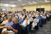  ?? WEBB / THE PALM BEACH POST KRISTINA ?? Wellington residents packed into the Village Hall council chambers as the Planning, Zoning and Adjustment Board heard two controvers­ial proposals on Wednesday.