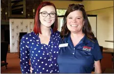  ?? NWA Democrat-Gazette/CARIN SCHOPPMEYE­R ?? Renita Wilkerson (left) and Candace Dixon-Horne help support Ronald McDonald House Charities of Arkoma on Aug. 28.