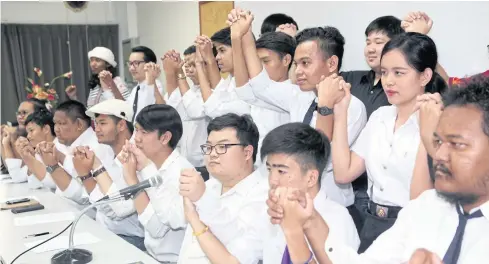  ?? APICHART JINAKUL ?? Students from 10 universiti­es, including activist Parit ‘Penguin’ Chiwarak, centre, wearing glasses, announce the establishm­ent of the Student Union of Thailand aiming to tackle undemocrat­ic politics, economic inequality and social injustice at...