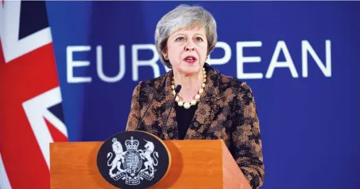  ?? Agence France-presse ?? Theresa May speaks during a press conference on the second day of a European Summit aimed at discussing the Brexit deal in Brussels, Belgium, on Friday.