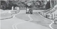  ?? BILL SANDERS, ASHEVILLE CITIZEN- TIMES ?? A 20- mile stretch of the Blue Ridge Parkway near Asheville, N. C., reopened Monday a little more than a month after a crack formed.